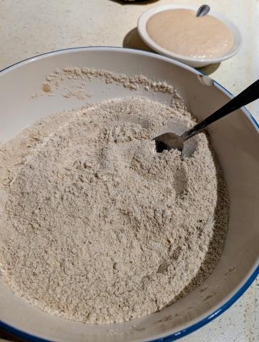 The mixed ingredients, and the foamed up yeast in the background
