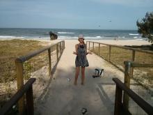 Cathy and butterflies on beach
